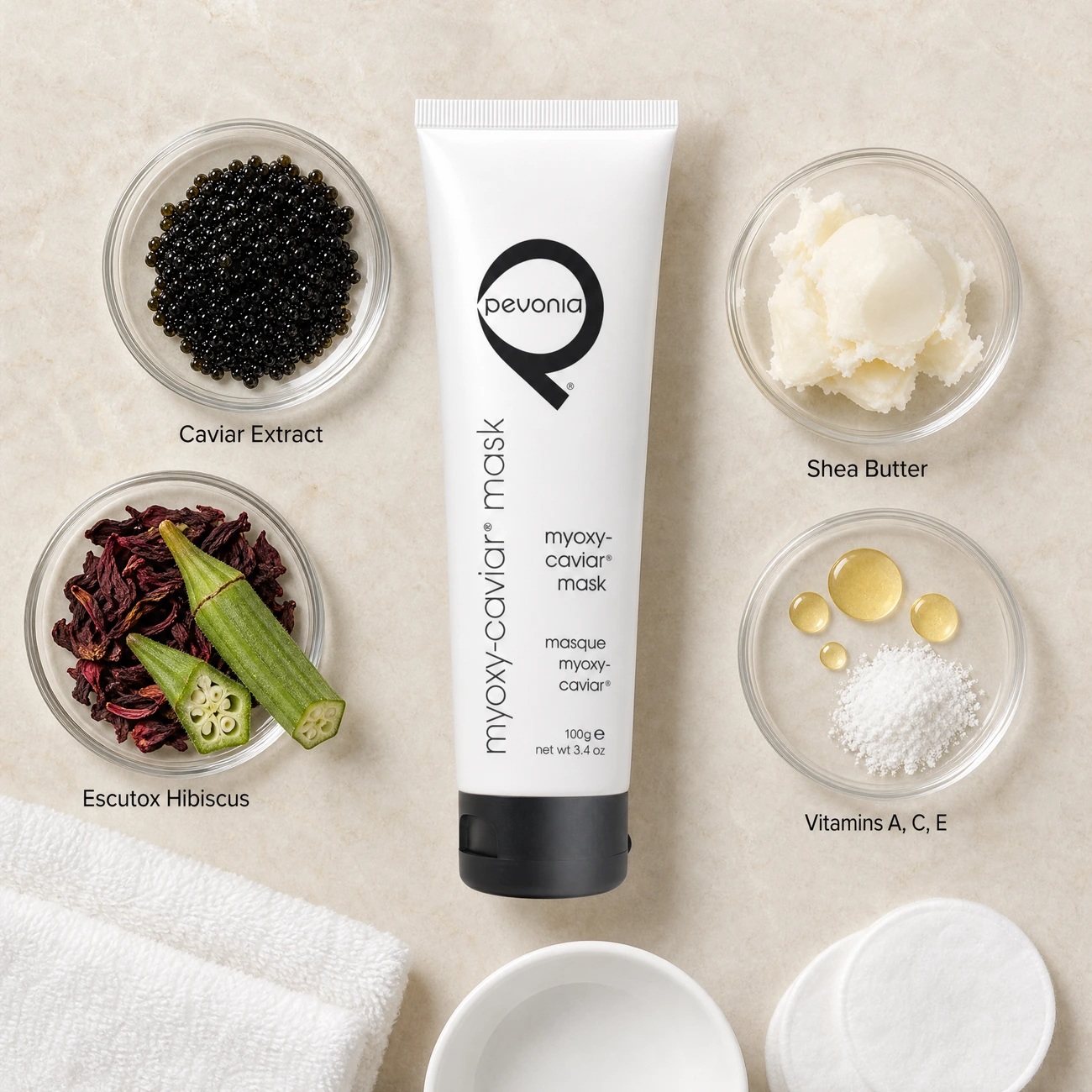 Pevonia Myoxy-Caviar Timeless Mask 100g ingredients flatlay with caviar extract, Escutox hibiscus, shea butter, and Vitamins A, C, and E in clean glass petri dishes for professional B2B education.