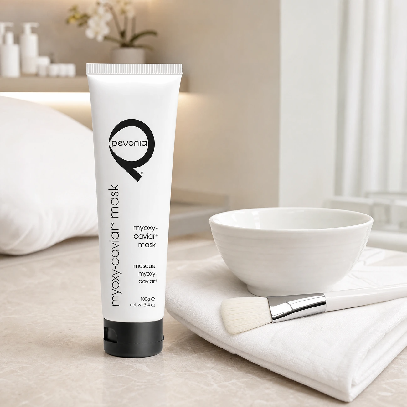 Pevonia Myoxy-Caviar Timeless Mask 100g professional white tube styled in a serene clinical spa treatment room for Beauty Collective Pro.