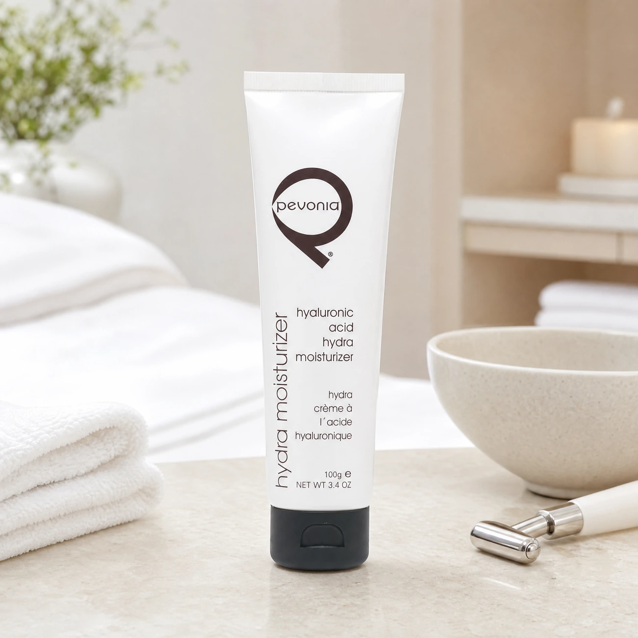 Pevonia Power Repair Hyaluronic Acid Hydra-Moisturizer 100g professional white tube styled in a serene clinical spa treatment room for Beauty Collective Pro.