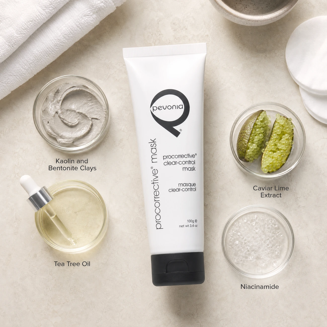 Pevonia ProCorrective Clear-Control Mask ingredients flatlay with kaolin clay, tea tree oil, caviar lime, and niacinamide in clean glass petri dishes for B2B education.