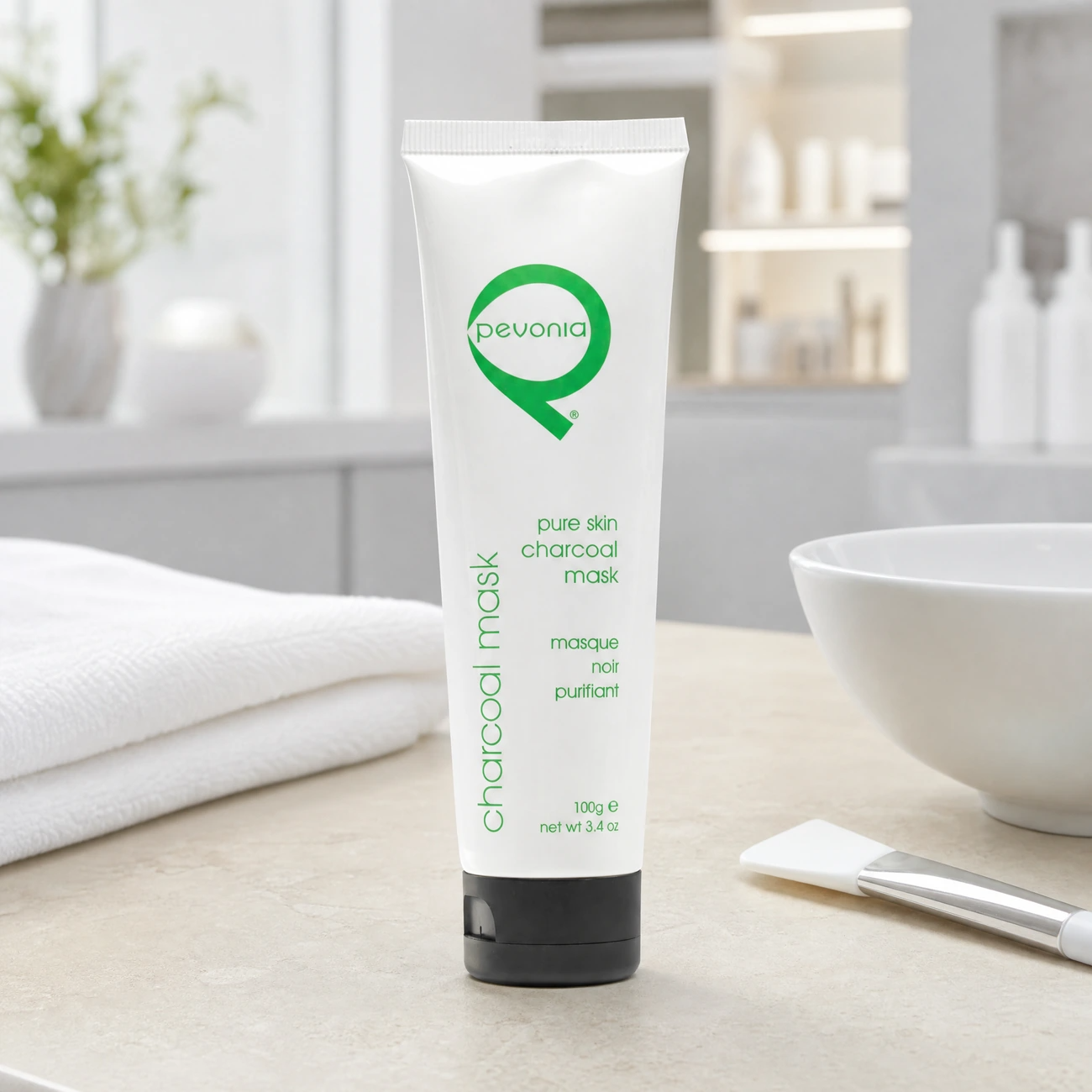 Pevonia Pure Skin Charcoal Mask 100ml professional white tube styled in a serene clinical spa treatment room for Beauty Collective Pro.