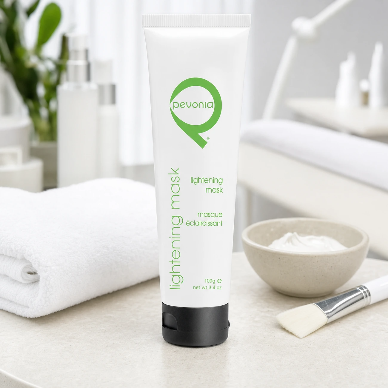 Pevonia Radiance Lightening Mask 100ml professional tube styled in a clean clinic treatment setting for Beauty Collective Pro.
