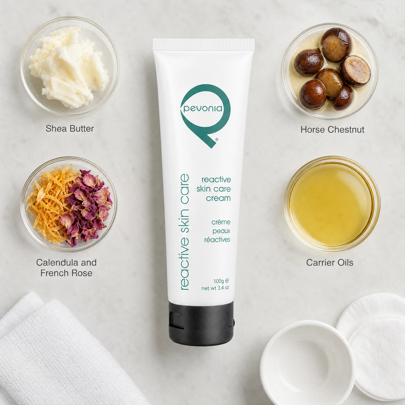 Pevonia Reactive Skin Care Cream 100ml ingredients flatlay with shea butter, calendula, French rose, horse chestnut, and carrier oils in clean glass petri dishes for professional B2B education.