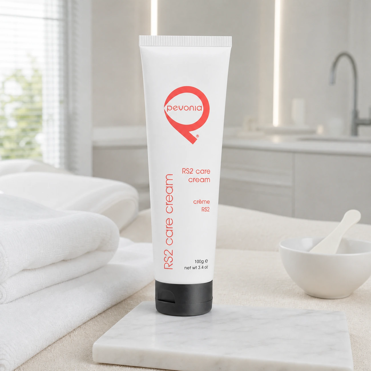 Pevonia RS2 Rosacea Care Cream 100g professional white tube styled in a serene clinical spa treatment room for Beauty Collective Pro.