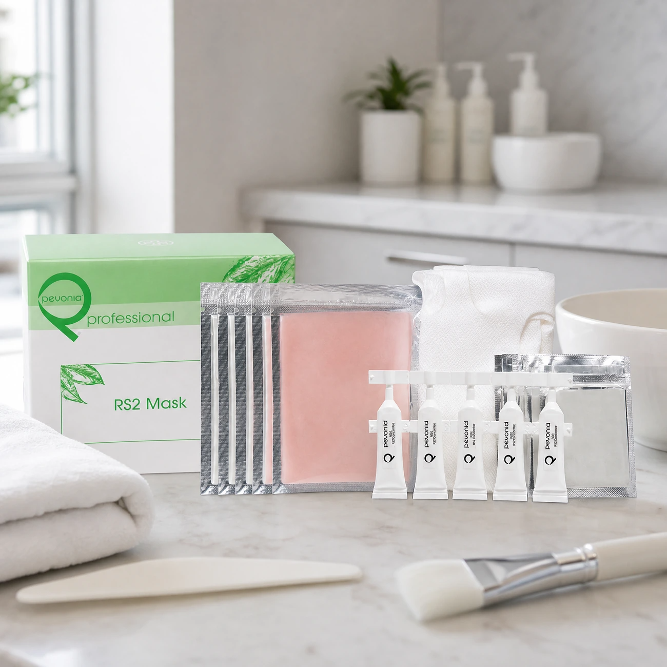 Pevonia RS2 Rosacea Mask Treatment 5-pack box, silver sachets with pink mask powder, RS2 Concentrate ampoules, and seaweed powder sachets styled in a serene clinical spa treatment room for Beauty Collective Pro.