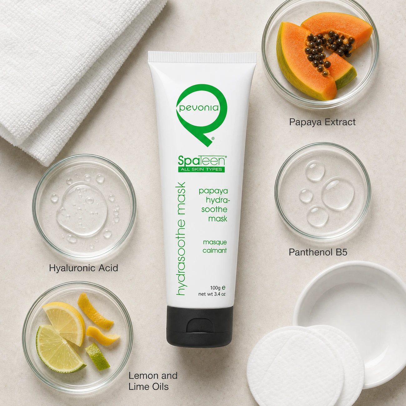 Pevonia SpaTeen Papaya Hydrasoothe Mask 100g ingredients flatlay with papaya extract, sodium hyaluronate, panthenol, and lemon and lime oils in clean glass petri dishes for professional B2B education.