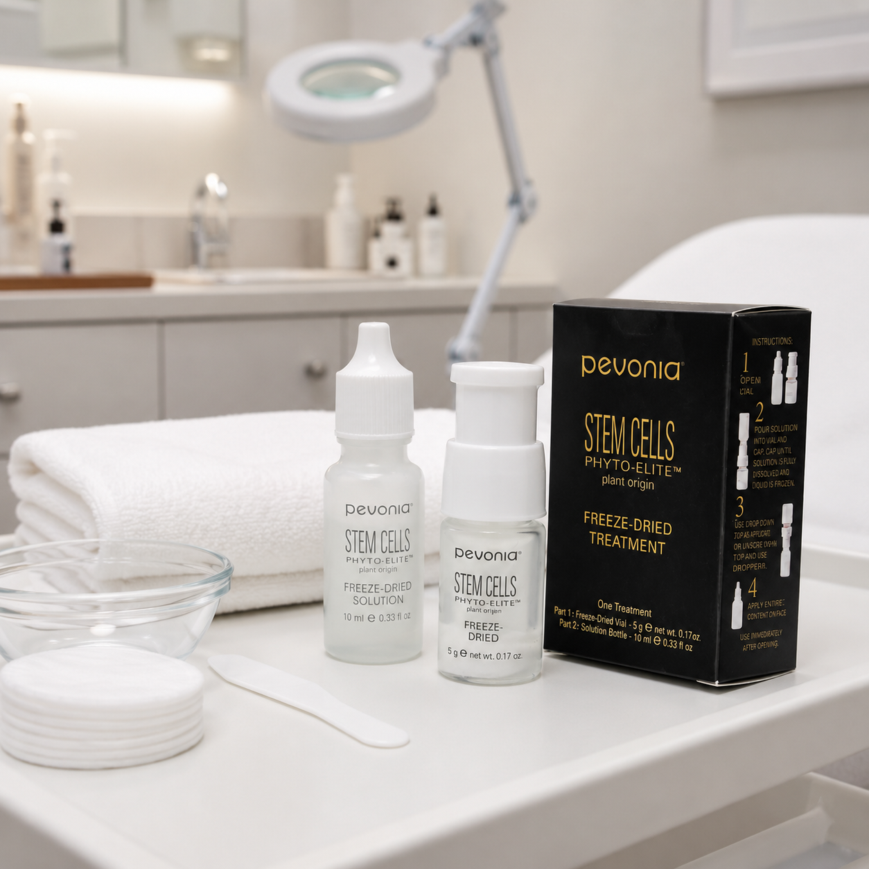 Pevonia Stem Cells Freeze Dried Treatment 5g and 10ml kit displayed on a therapist trolley in a medi-clinic treatment room with unbranded treatment accessories.