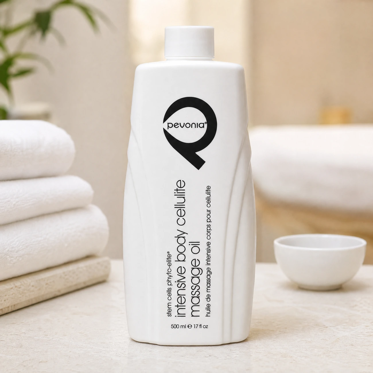 Pevonia Stem Cells Phyto-Elite Intensive Body Cellulite Massage Oil 500ml professional sculpted white bottle styled in a serene clinical spa treatment room for Beauty Collective Pro.