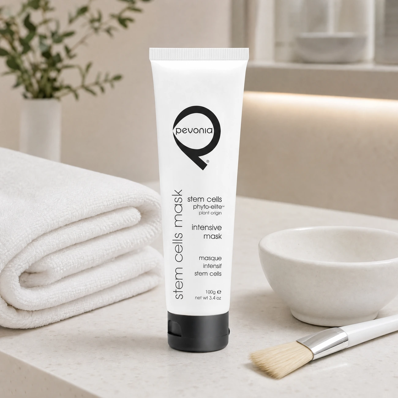 Pevonia Stem Cells Phyto-Elite Intensive Mask 100g professional white tube styled in a serene clinical spa treatment room for Beauty Collective Pro.