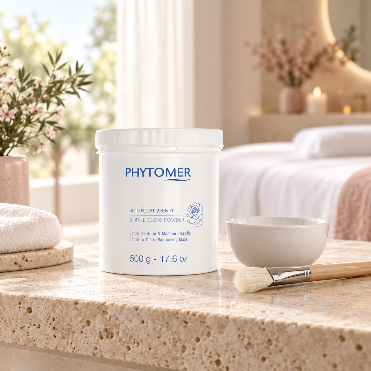 PHYTOMER 2-in-1 Glow Powder 500g with mixing bowl and mask brush in a professional spa treatment room