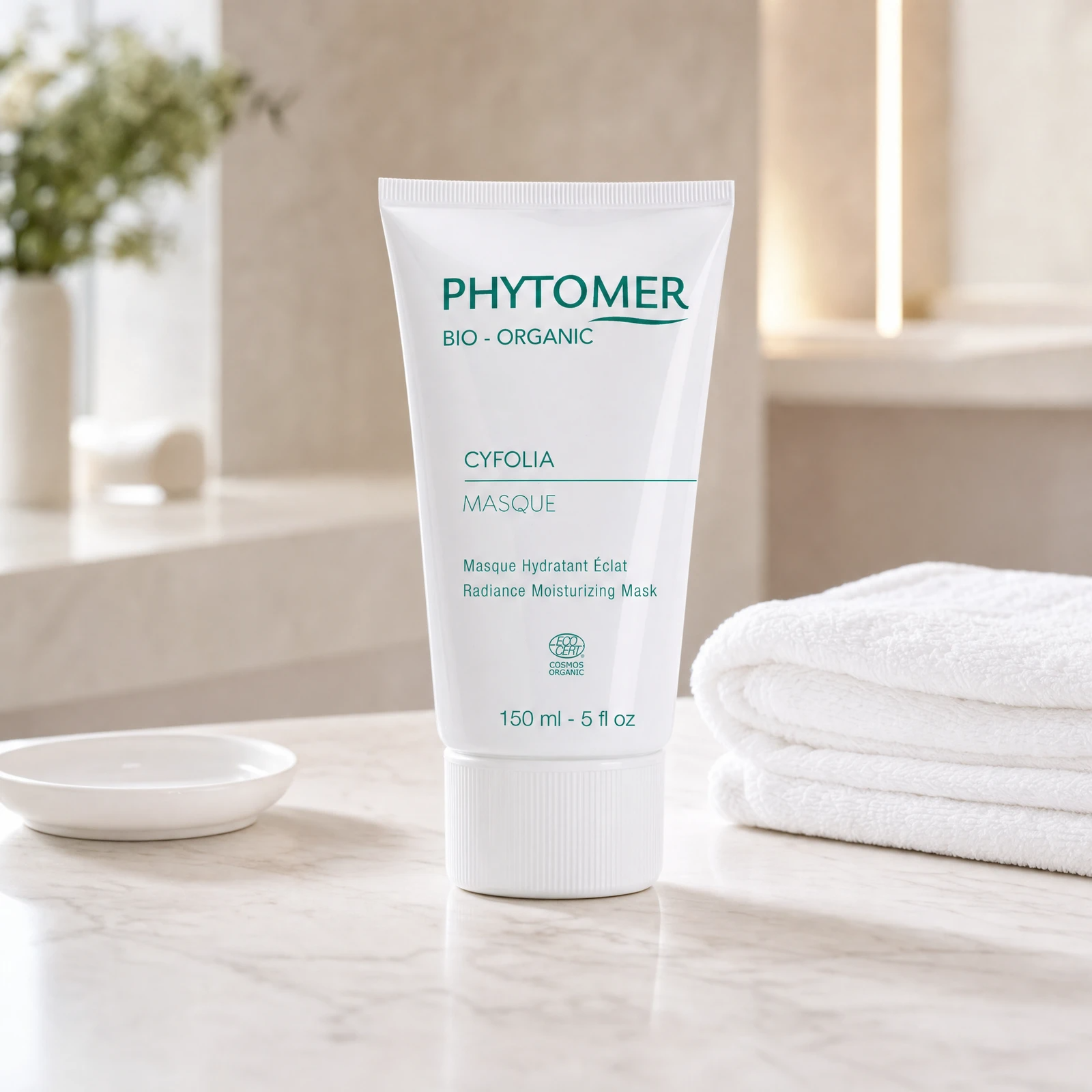 Phytomer Cyfolia Organic Radiance Moisturising Mask 150ml professional tube on a premium beauty clinic marble counter with white spa towels and ceramic dish