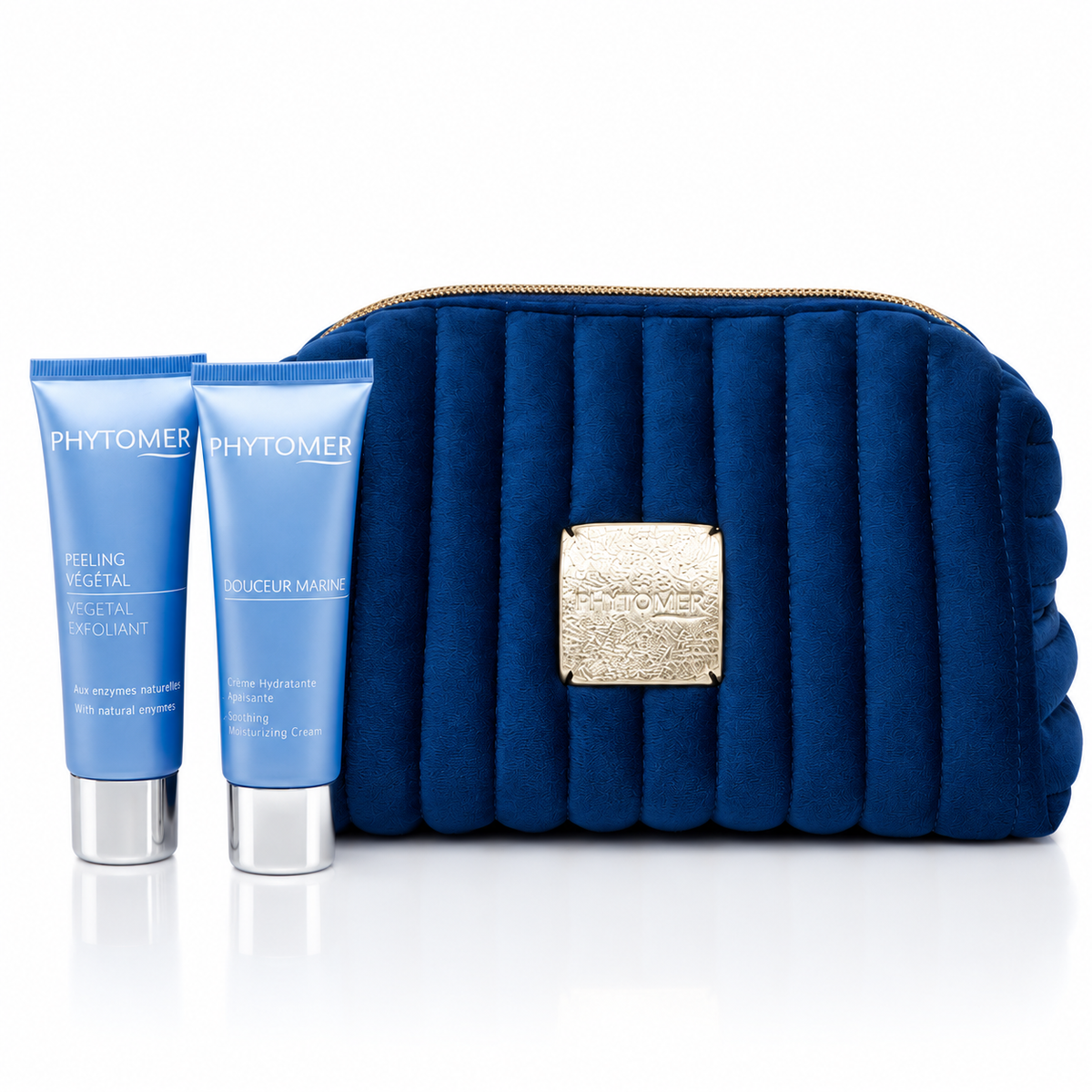 Phytomer Douceur Marine cream and Vegetal Exfoliant displayed beside a blue cosmetics pouch on a white background.