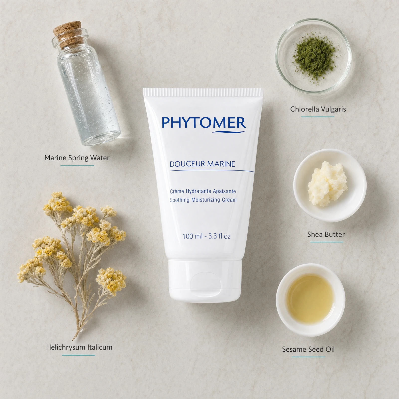 Phytomer Douceur Marine Soothing Moisturizing Cream 100ml flatlay with key ingredients including Marine Spring Water, Chlorella Vulgaris, Helichrysum Italicum, Shea Butter and Sesame Seed Oil