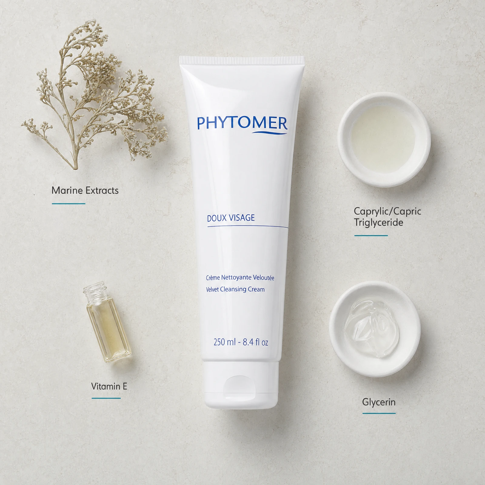 Phytomer Doux Visage Velvet Cleansing Cream 250ml flatlay with key ingredients including Marine Extracts, Caprylic/Capric Triglyceride, Vitamin E and Glycerin