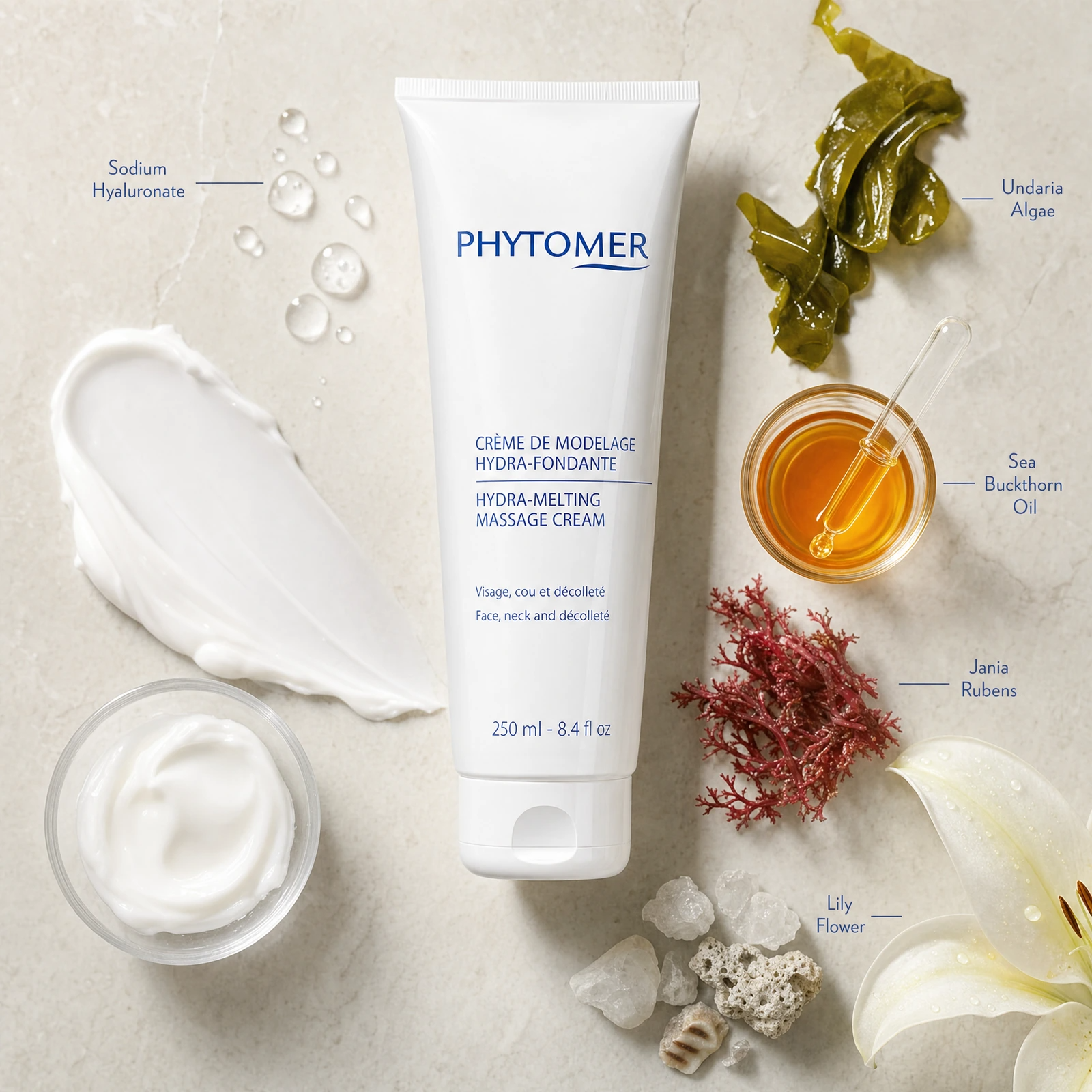 Phytomer Hydra-Melting Massage Cream Face, Neck and Décolleté 250ml ingredient flatlay featuring sodium hyaluronate, Undaria algae, sea buckthorn oil, Jania rubens and lily flower.