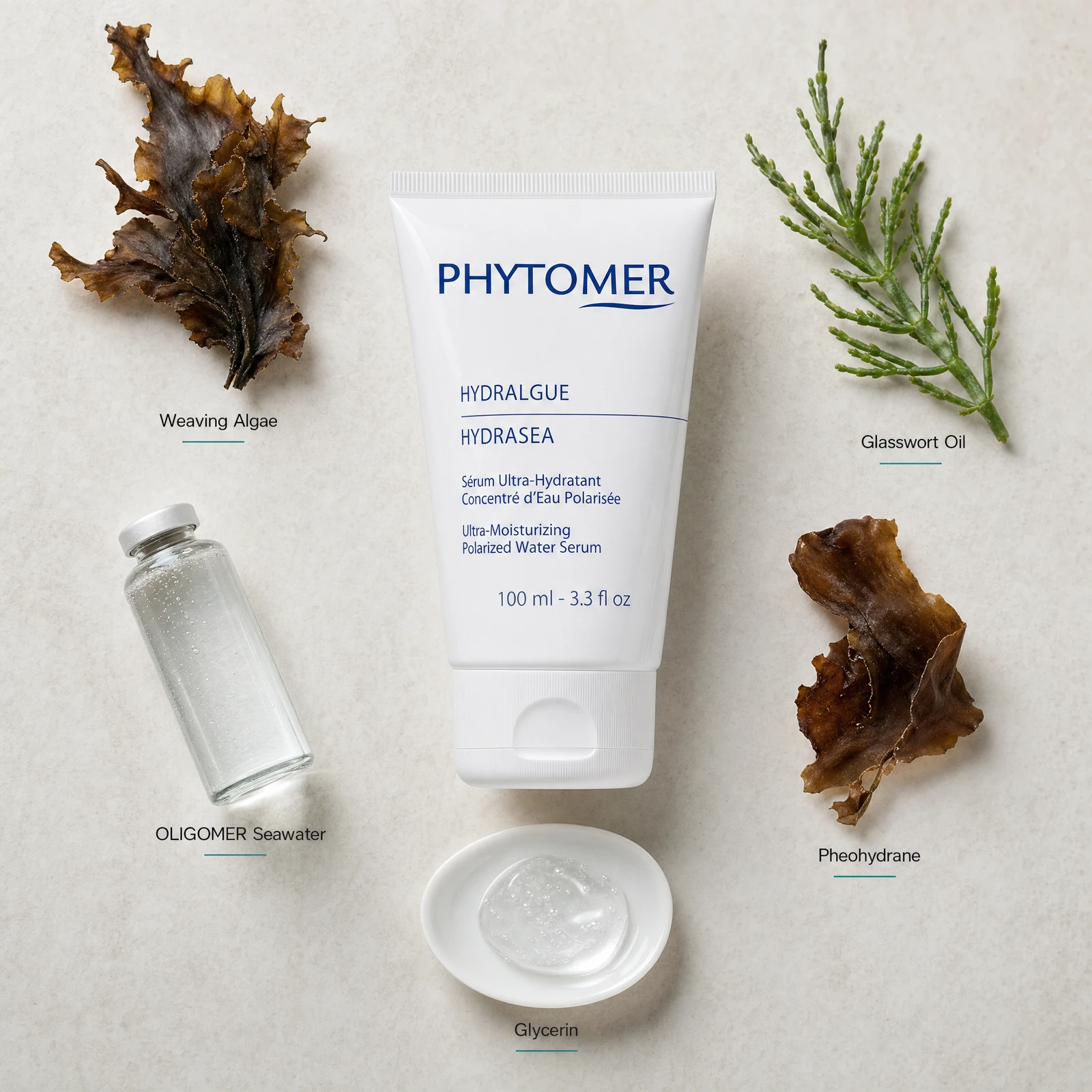 Phytomer Hydrasea Ultra-Moisturizing Polarized Water Serum 100ml flatlay with key ingredients including Weaving Algae, Glasswort Oil, OLIGOMER Seawater, Pheohydrane and Glycerin