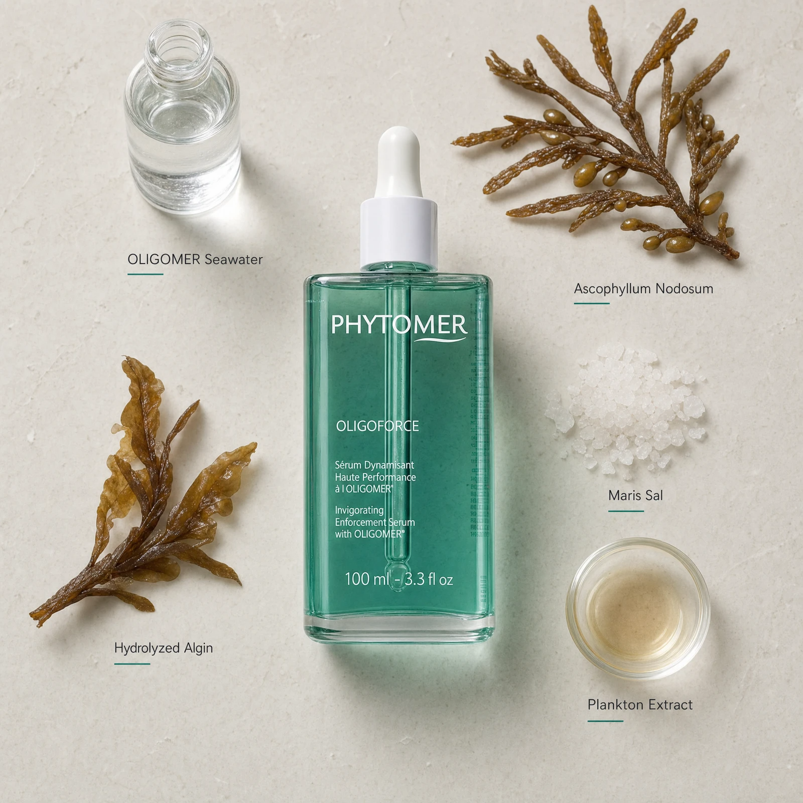 Phytomer Oligoforce Invigorating Enforcement Serum 100ml flatlay with key ingredients including OLIGOMER Seawater, Ascophyllum Nodosum brown algae, Hydrolyzed Algin, Maris Sal and Plankton Extract