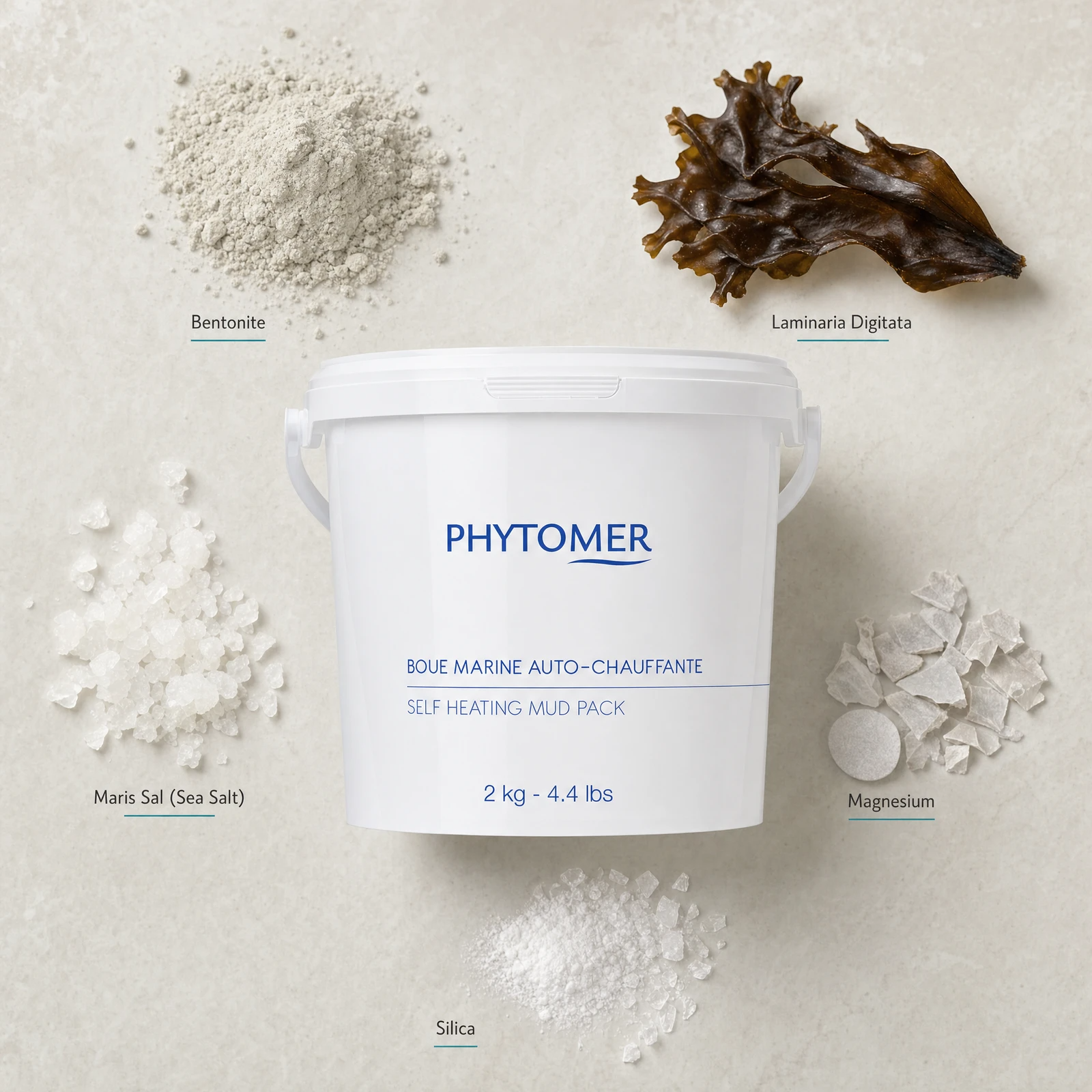 Phytomer Self Heating Mud Pack 2kg flatlay with key ingredients including Bentonite, Laminaria Digitata seaweed, Maris Sal sea salt, Magnesium and Silica