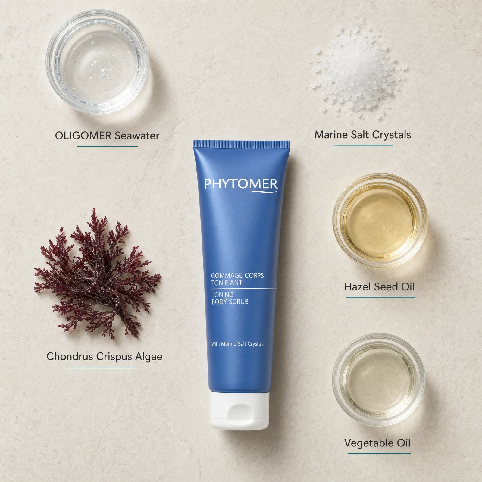 Phytomer Toning Body Scrub with Marine Salt Crystals 150ml flatlay on limestone surface with OLIGOMER Seawater, Marine Salt Crystals, Chondrus Crispus Algae, Hazel Seed Oil, and Vegetable Oil