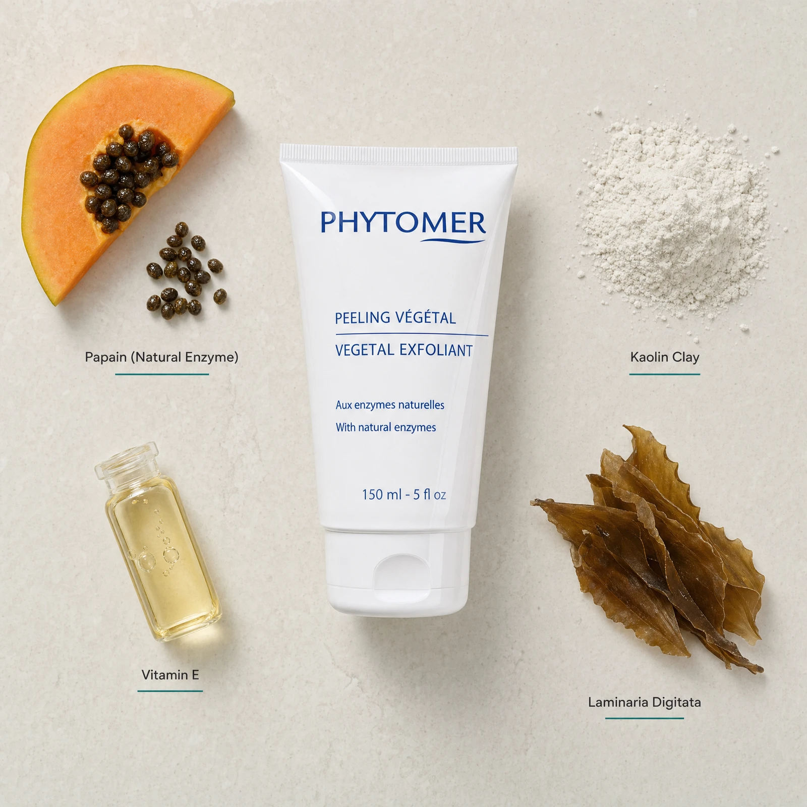 Phytomer Vegetal Exfoliant with Natural Enzymes 150ml flatlay with key ingredients including Papain Natural Enzyme, Vitamin E, Kaolin Clay and Laminaria Digitata marine algae