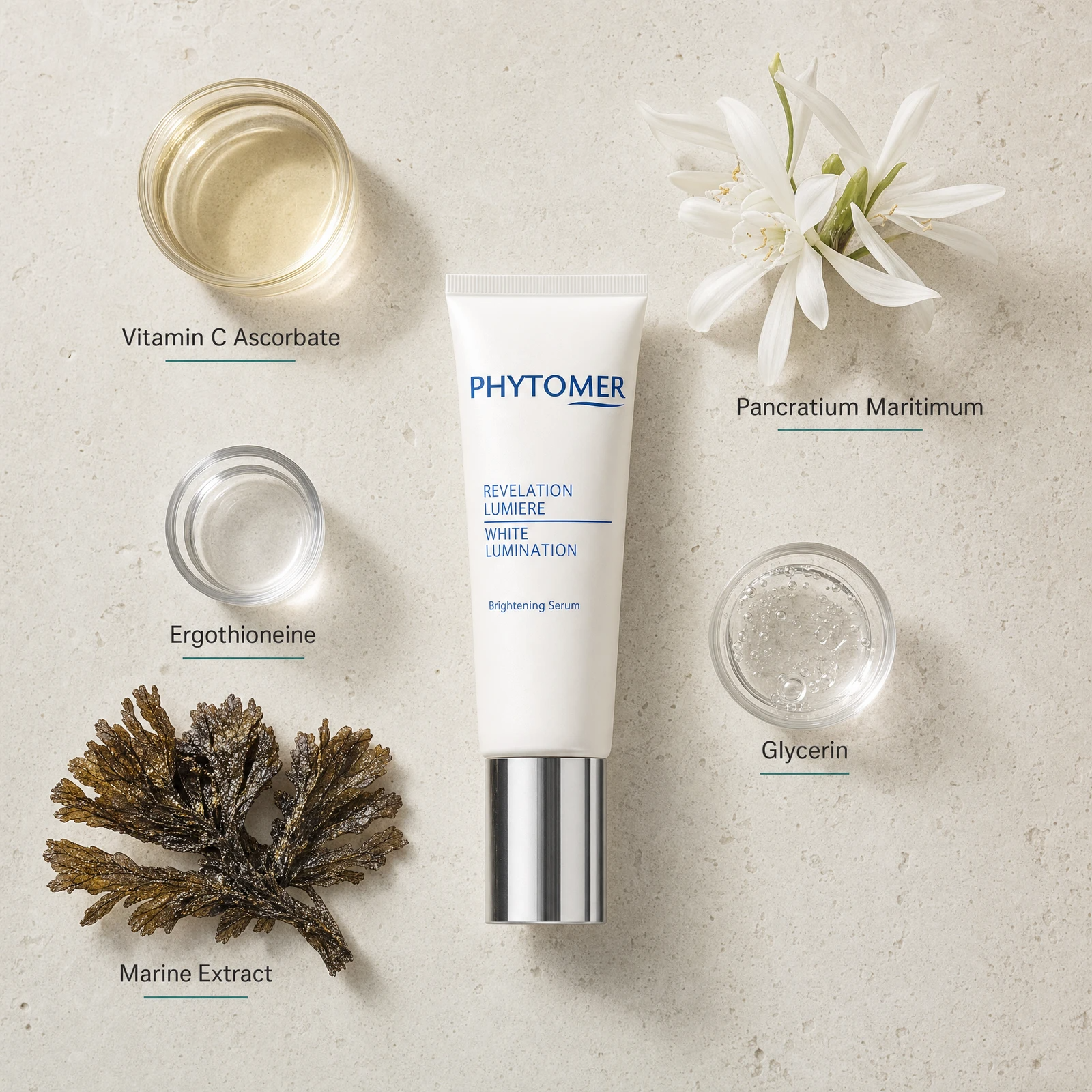Phytomer White Lumination Brightening Serum 30ml flatlay on limestone surface with Vitamin C Ascorbate, Pancratium Maritimum, Ergothioneine, Glycerin, and Marine Extract