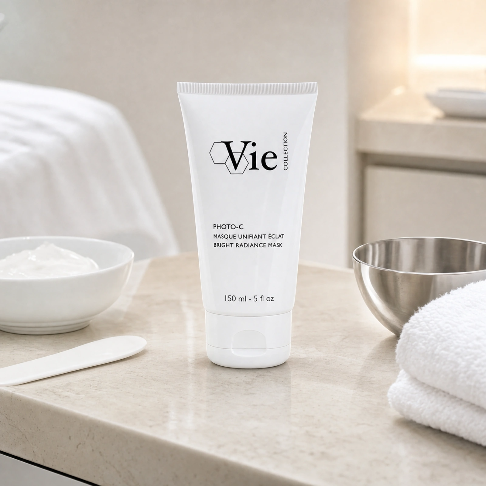 Vie Collection Photo-C Bright Radiance Mask 150ml displayed in a premium clinical treatment-room setting for professional brightening and radiance treatments.