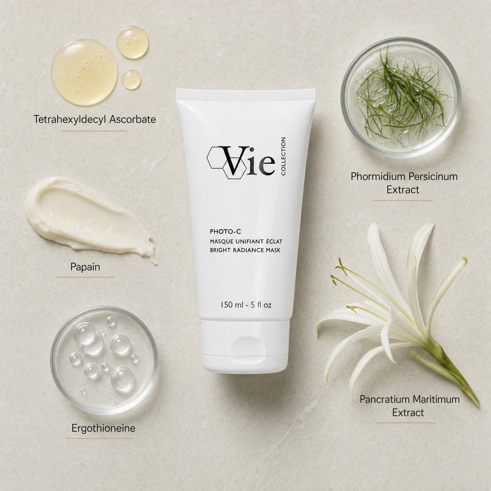 Vie Collection Photo-C Bright Radiance Mask 150ml ingredient flatlay with Tetrahexyldecyl Ascorbate, Phormidium Persicinum Extract, Papain, Pancratium Maritimum Extract and Ergothioneine.