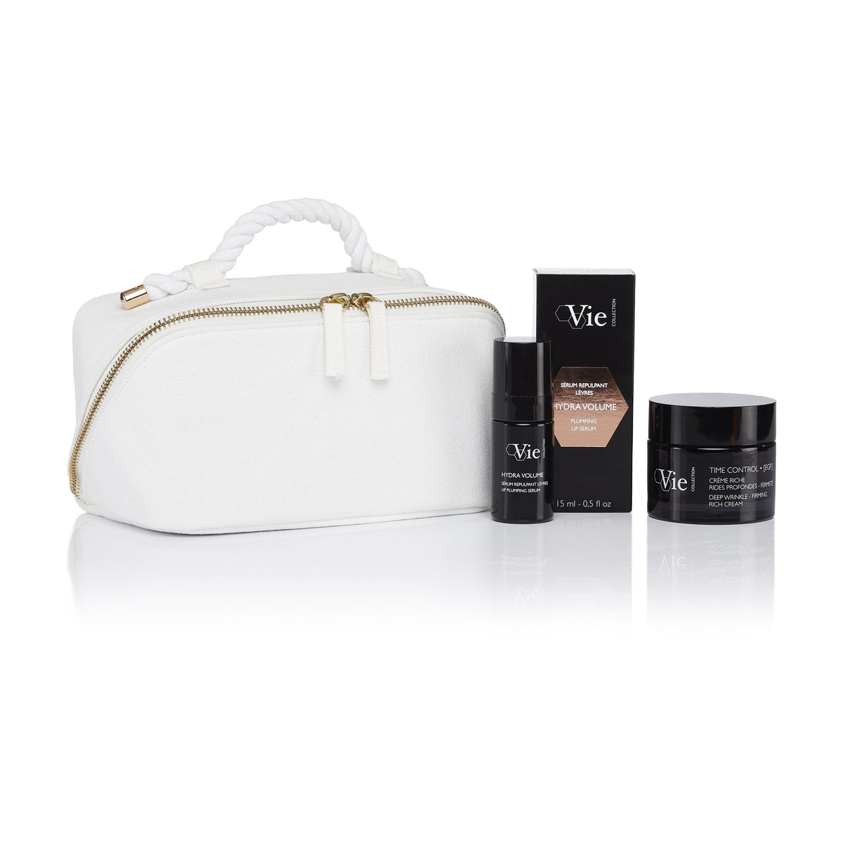 Vie Collection Time Control Ritual Gift Set with Time Control cream, Hydra Volume Lip Plumping Serum and its box, and a white pouch.