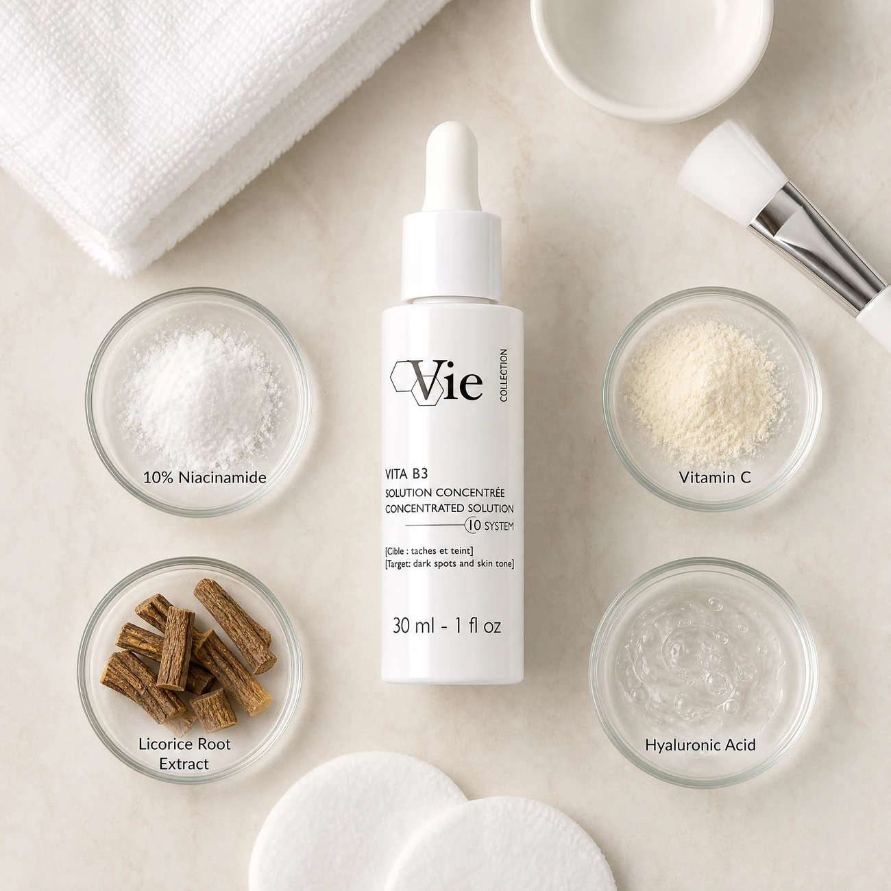 Vie Collection Vita B3 Concentrated Solution 30ml ingredients flatlay with 10% niacinamide, vitamin C, licorice root extract, and hyaluronic acid in clean glass petri dishes for professional B2B education.