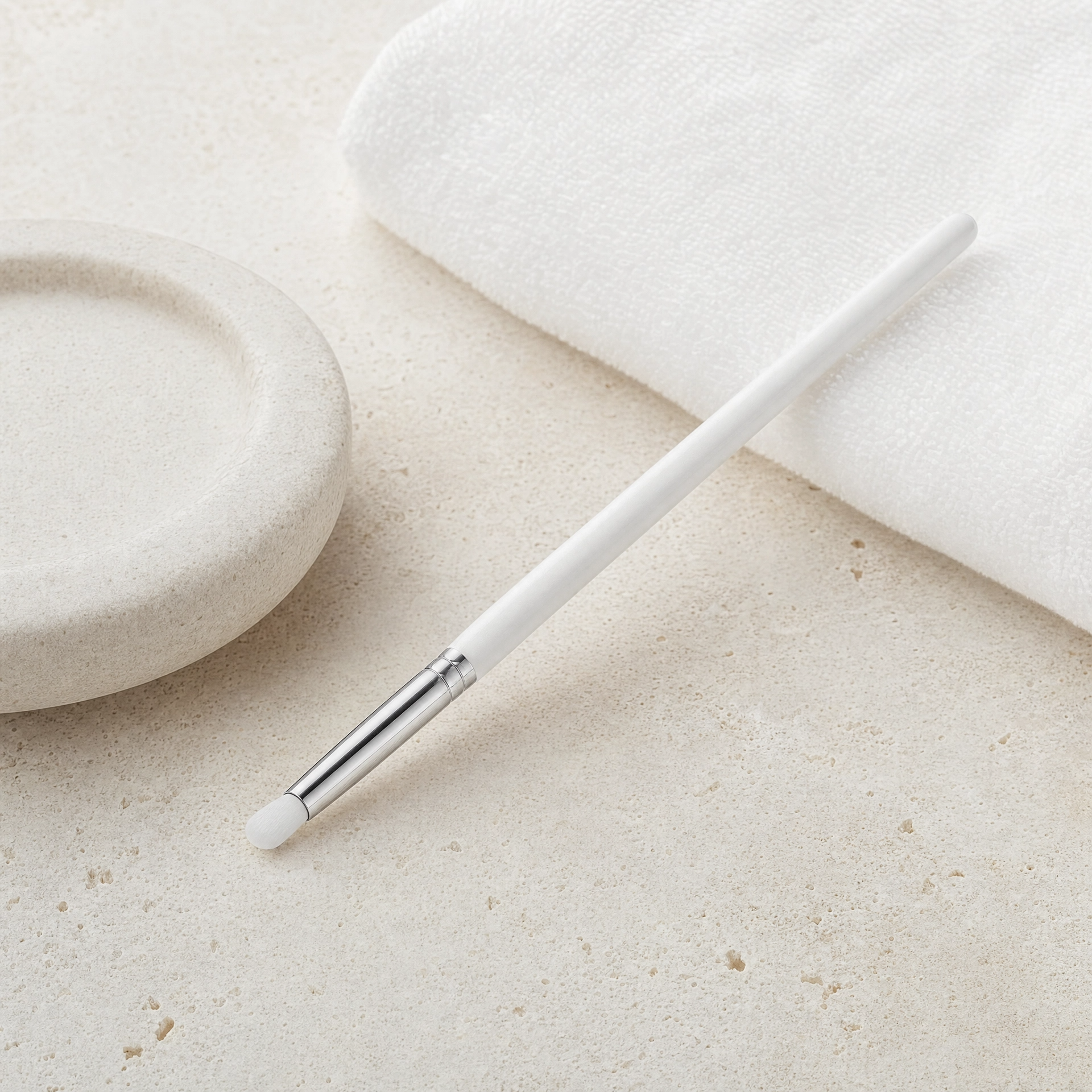 Vie Collection Wrinkles Corrective Brush displayed on a premium professional treatment bench
